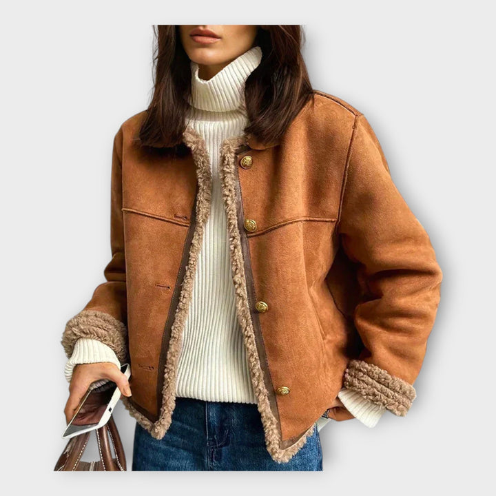 Elegantna kožna jakna s toplom podstavom i bezvremenskim stilom